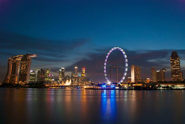 istock Singapore's financial district at night 491893619