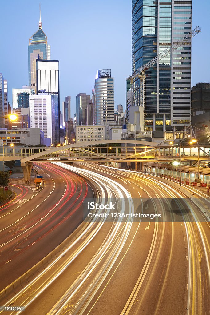 Road light trails on streetscape buildings in HongKong City road light trails of streetscape buildings backgrounds in HongKong Architecture Stock Photo