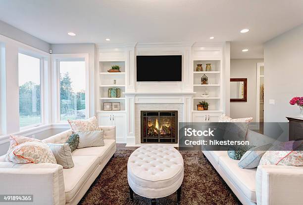 Living Room In Luxury Home Stock Photo - Download Image Now - Fireplace, Living Room, Television Set