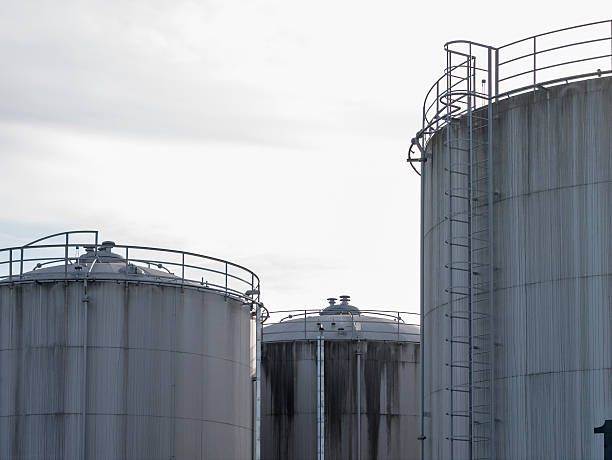 istock Cylindrical gas storage tanks at refinery 491894491