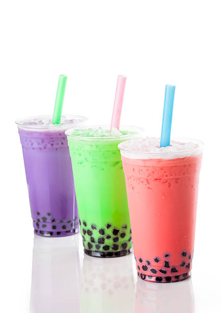 istock Three glasses of colourful bubble tea, with straws. 491904762