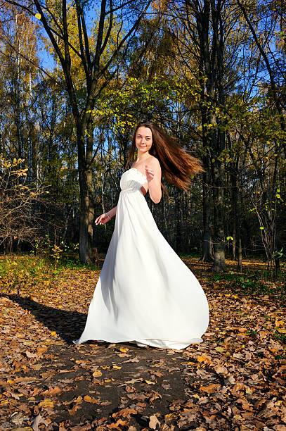 istock Girl in white dress 491908264