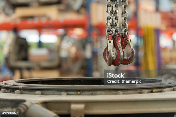 Steel Hook And Chain Is Hanging Off Ceiling Stock Photo - Download Image Now - Auto Repair Shop, Business, Chain - Object