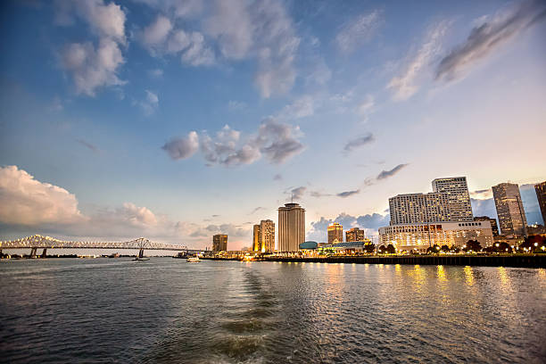 New Orleans Louisiana CityScape Evening image of the New Orleans skyline from the Delta of the Mississipi River mississippi delta stock pictures, royalty-free photos & images