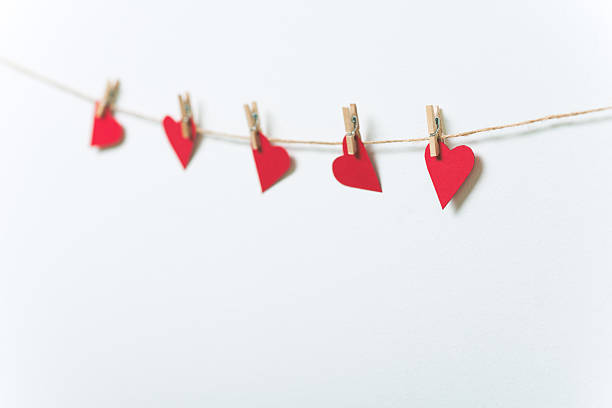 istock Red hearts hanging on clothesline 491911596