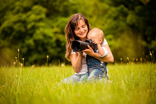 istock Mother, child and camera 491911654