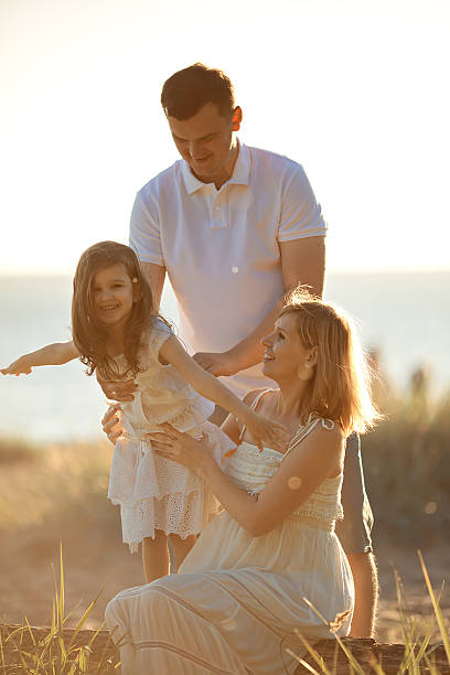 istock Happy family walking in summer 491911758
