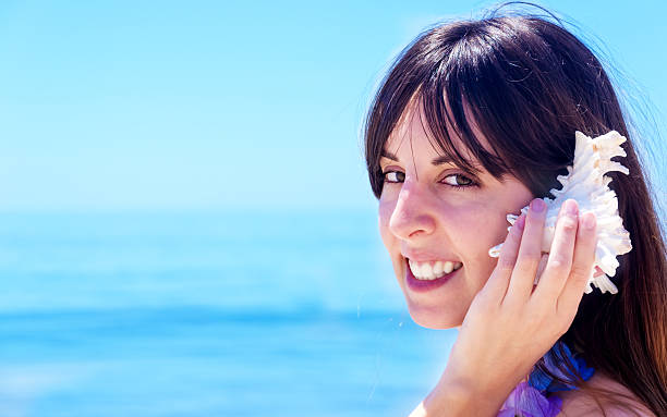 istock Beautiful yang Girl by the ocean 491913439