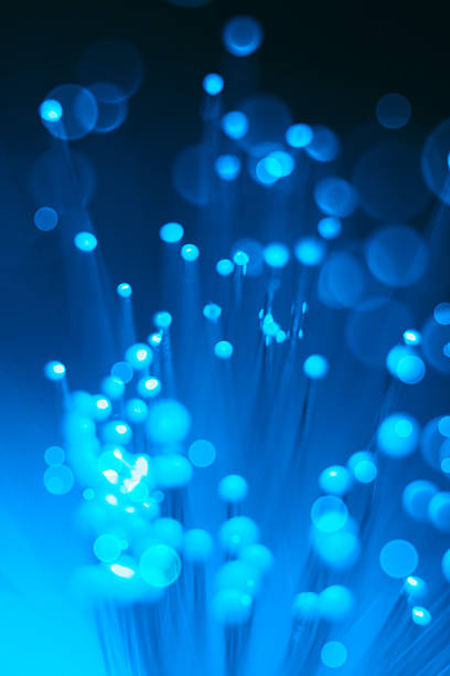 istock bunch of the blue optical fibres 491914387