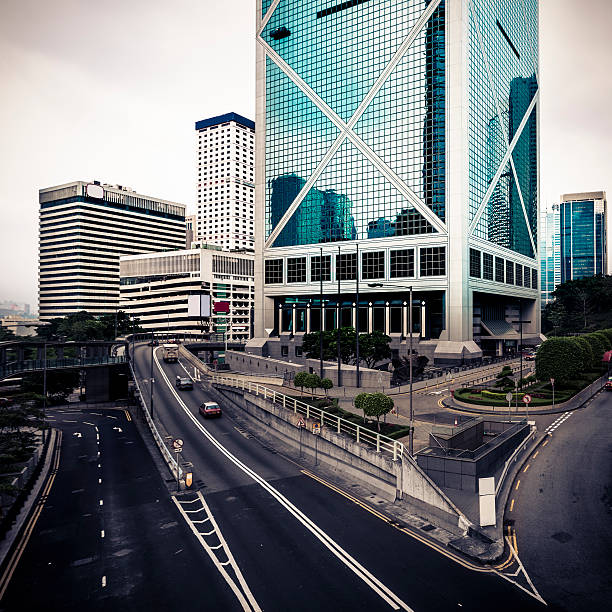 traffic through hong kong .view of city street. blue toned images.