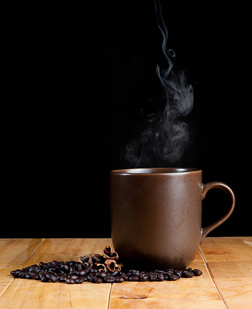 istock cup of black coffee over grunge wood 491915871