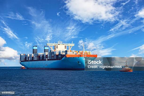 Tugboat Towing Container Ship Stock Photo - Download Image Now - Ship, Tugboat, Nautical Vessel