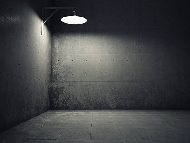 istock Dirty concrete wall illuminated 491921360