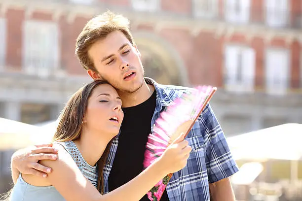 Photo of Couple suffering summer heat