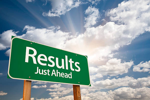 istock Results Green Road Sign Over Clouds 491925526