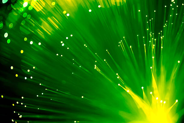 fibres optiques abstrait (verte). - fiber optic technology abstract green photos et images de collection