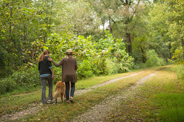istock Couple takes a stroll in the woods 491925988