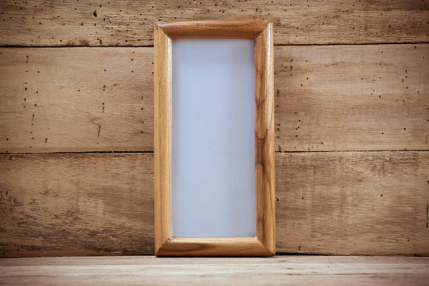 istock frame picture on wood background. 491934190