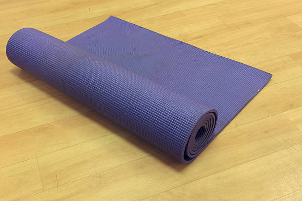istock selective focus yoka mat on wood background. 491934208