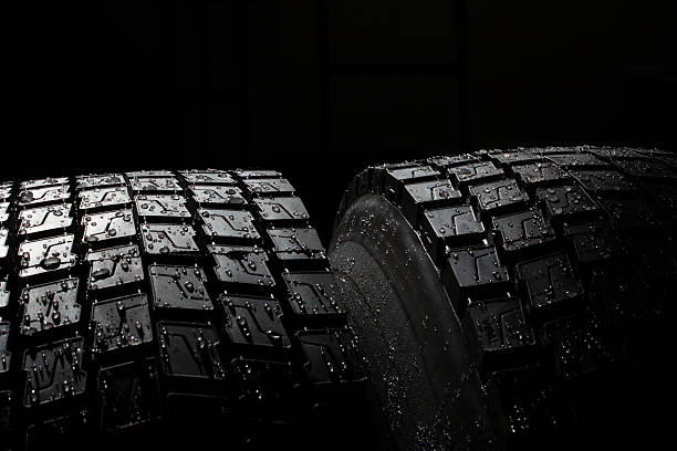 istock truck tires in rain 491934886