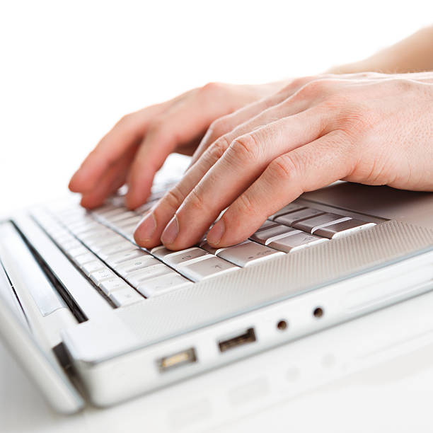 istock Close-up of typing male hands on keyboard 491936991