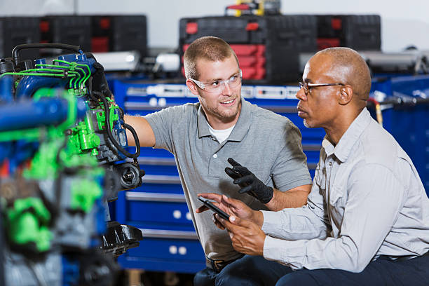 istock Vocational class, learning to repair diesel engine 491937102