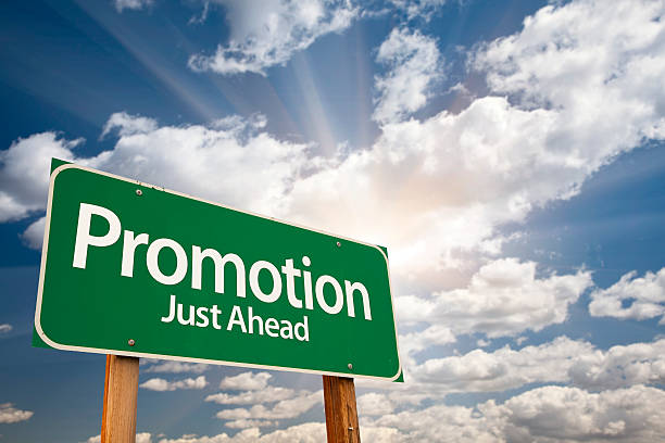 istock Promotion Green Road Sign Over Clouds 491937986