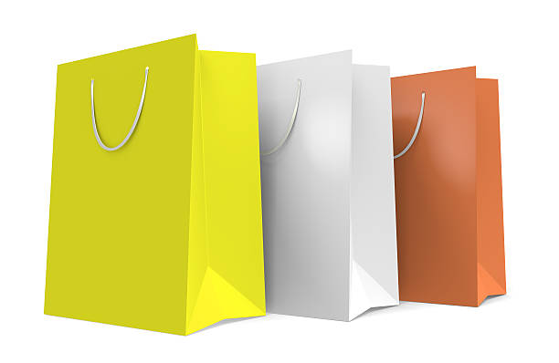 drei papier-einkaufstaschen mit einem herbst farbe themen - shopping bag orange bag handle stock-fotos und bilder