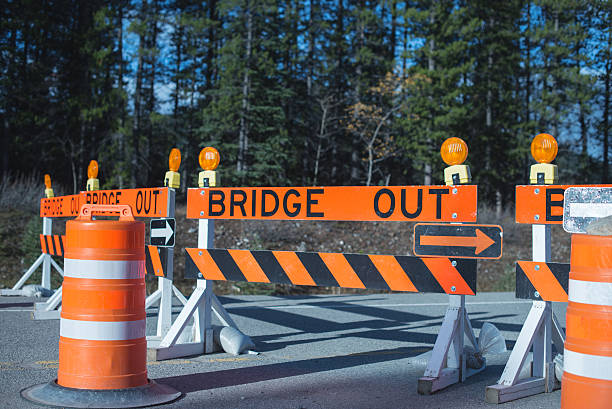 istock Bridge Out signage danger sign barrier 491939240