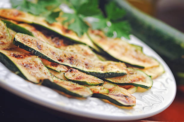 istock Grilled zucchini on a white plate 491940694
