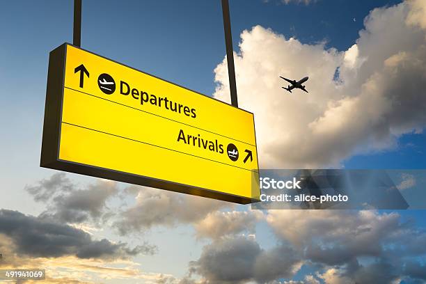 Departure Arrival Sign Jet Airplane Take Off Airport Stock Photo - Download Image Now