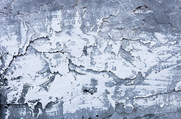 istock Partly whitewashed surface of the uneven hardened cement mortar 491945852
