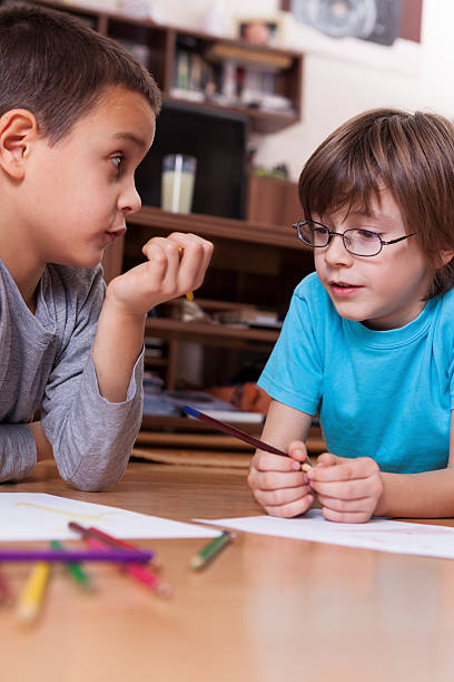 istock Little children drawing on the floor 491950960