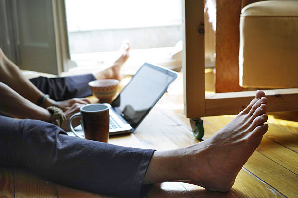 istock Girl Working On Her Computer And Enjoying Drinking Coffee 491952196