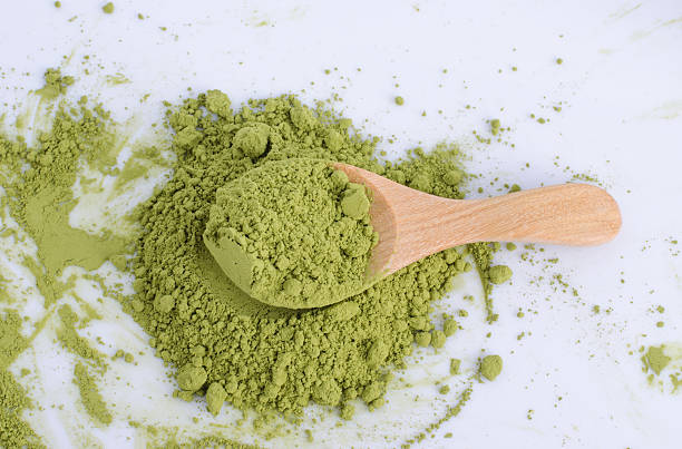 istock green powder heap isolated on white background 491959460