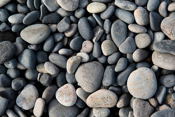 istock Round pebbles on the black beach, texture background, Iceland 491959504