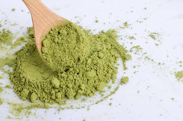 istock green powder heap isolated on white background 491959560