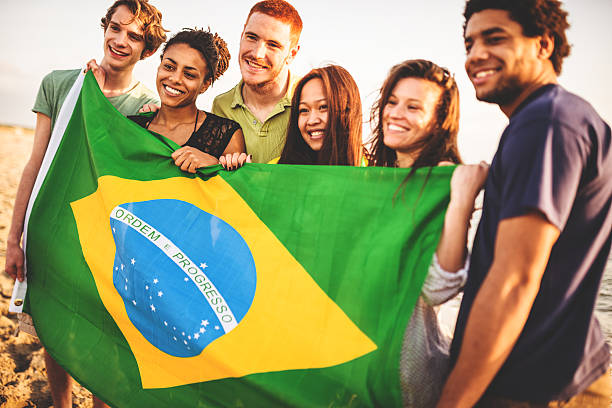 istock brazil supporter cheering togetherness at the match 491960243