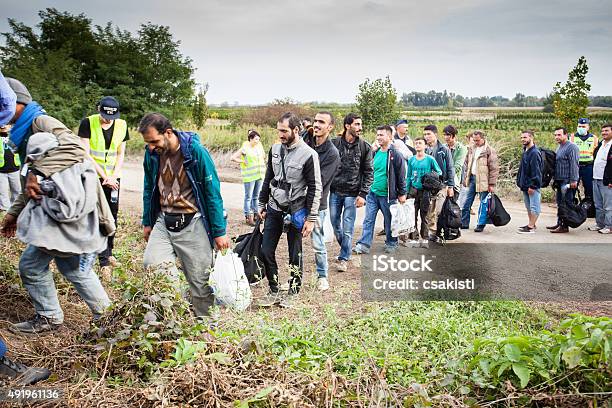 War Refugees At Zakany Railway Station Stock Photo - Download Image Now - Police Force, Refugee, 2015