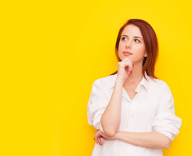 istock woman on yellow background 491961400