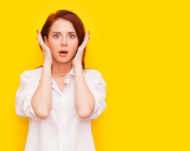 istock woman on yellow background 491961412
