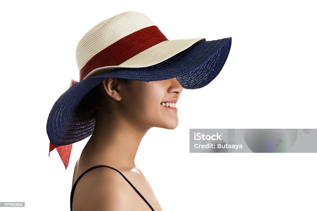 Young Asian woman wearing straw hat. Young Asian woman wearing straw hat isolated on white background. 2015 Stock Photo