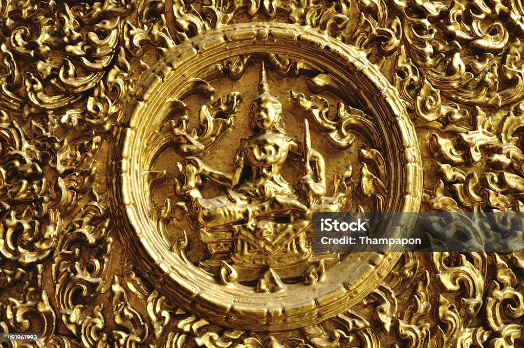 The Ancient sign made of carved wood. The Ancient sign made of carved wood.  It is ancient Thai art. Abstract Stock Photo