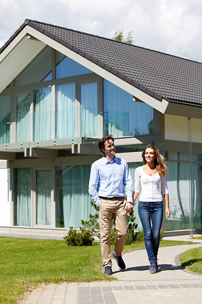 istock couple walking from house 491962508