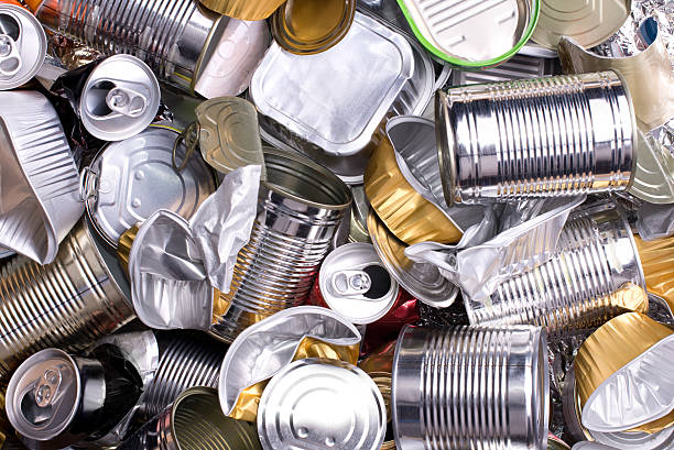 Metal cans and tins prepared for recycling Metal cans and tins prepared for recycling drink can photos stock pictures, royalty-free photos & images