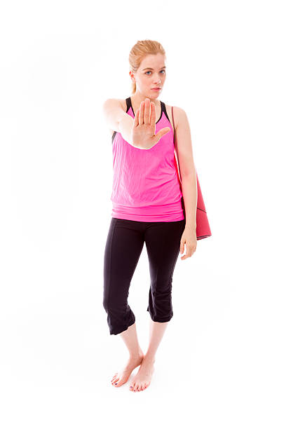 istock Young woman making stop gesture sign 491963393
