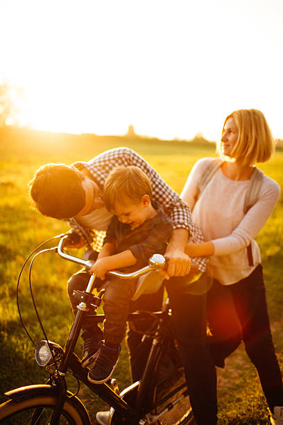 istock Loving family on a bicycle 491963442