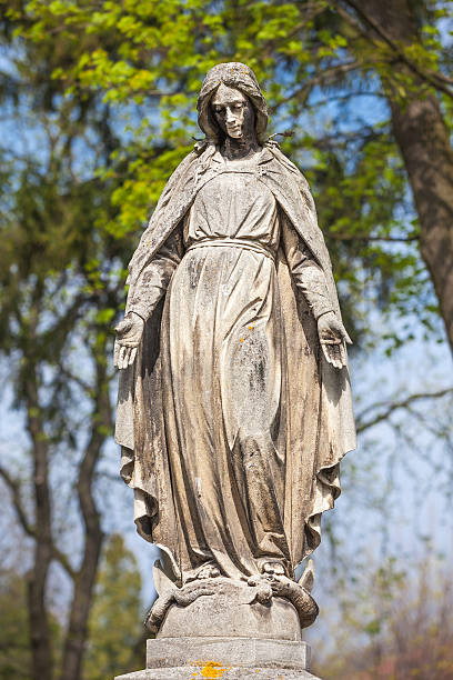 istock statue on grave in the old cemetery 491963801