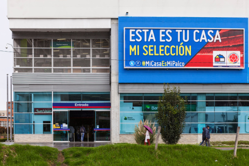 Bogota, Colombia - May 18, 2014: The main entrance to HomeCenter on Carrera Novena in the capital city of Bogota in Colombia, South America.  Translated, the seasonal advertisement on the wall says, 