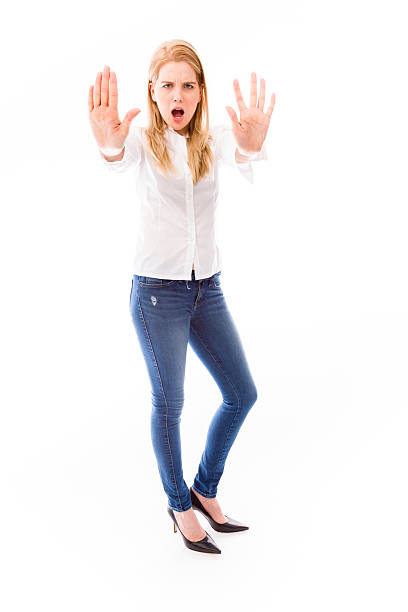 istock Young woman making stop gesture sign 491965447